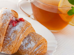 bread covered with sugar served in plate