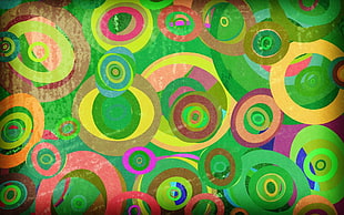 green, pink, and yellow abstract painting