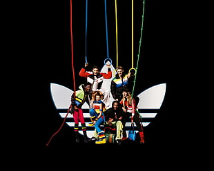 photo of people with Adidas background