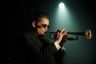 man playing trumpet wearing black suit HD wallpaper