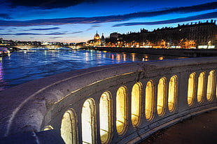 photography of body of water near bride during night time, lyon
