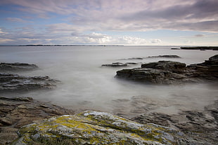 white fog on stone fragments during daytime