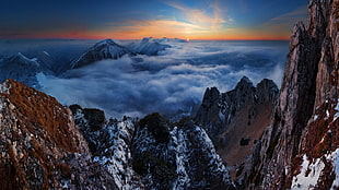 aerial photo of clouds and mountains during daytime HD wallpaper