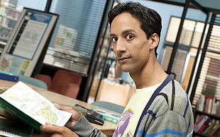 man holding map paper HD wallpaper