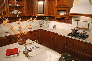 white and brown modular kitchen set