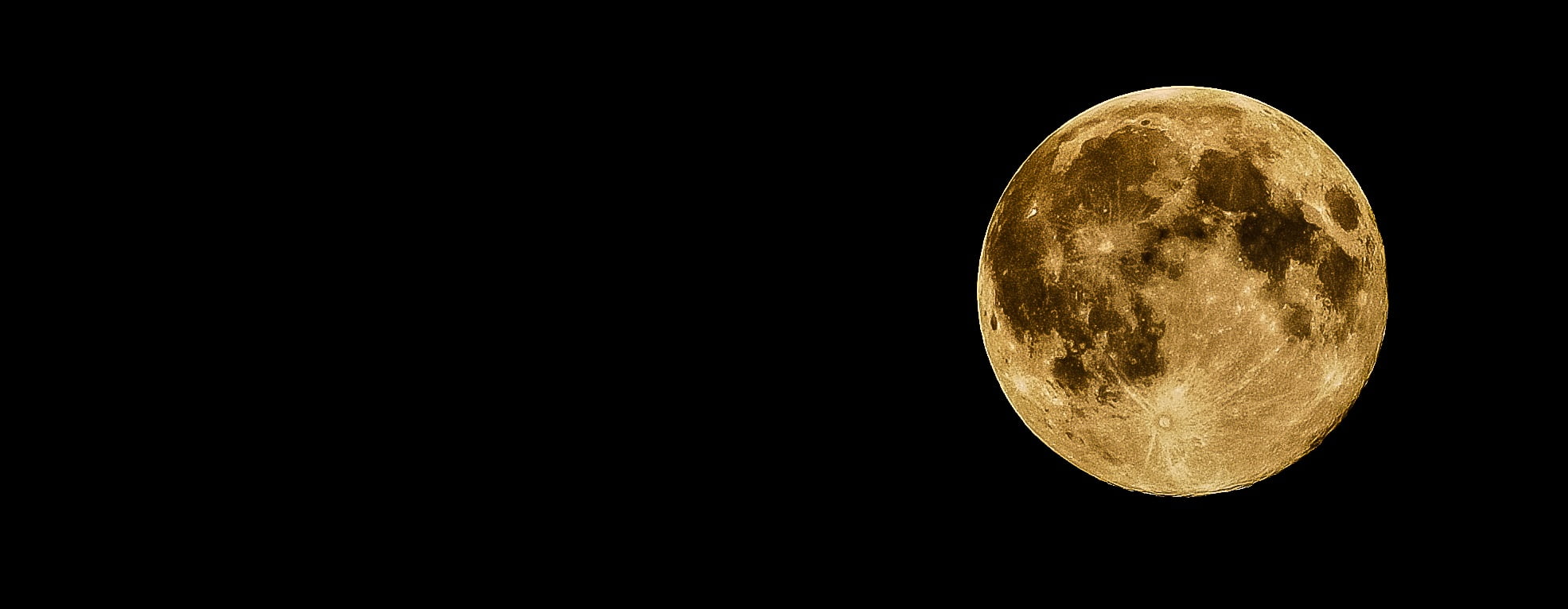 low angle photography of full moon under black background