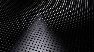 closeup photo of spikey black metal board