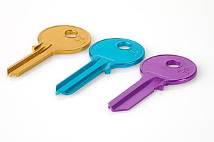 gold, blue, and purple keys