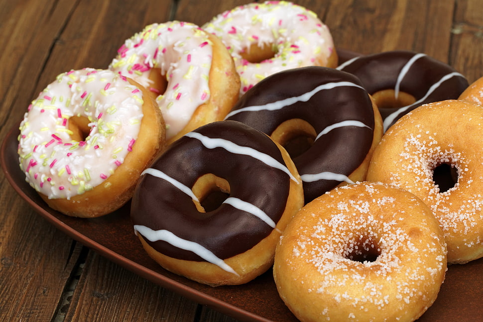 photo of nine assorted flavored of doughnuts HD wallpaper