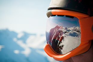 red and black corded headphones, helmet, reflection, snow, mountains