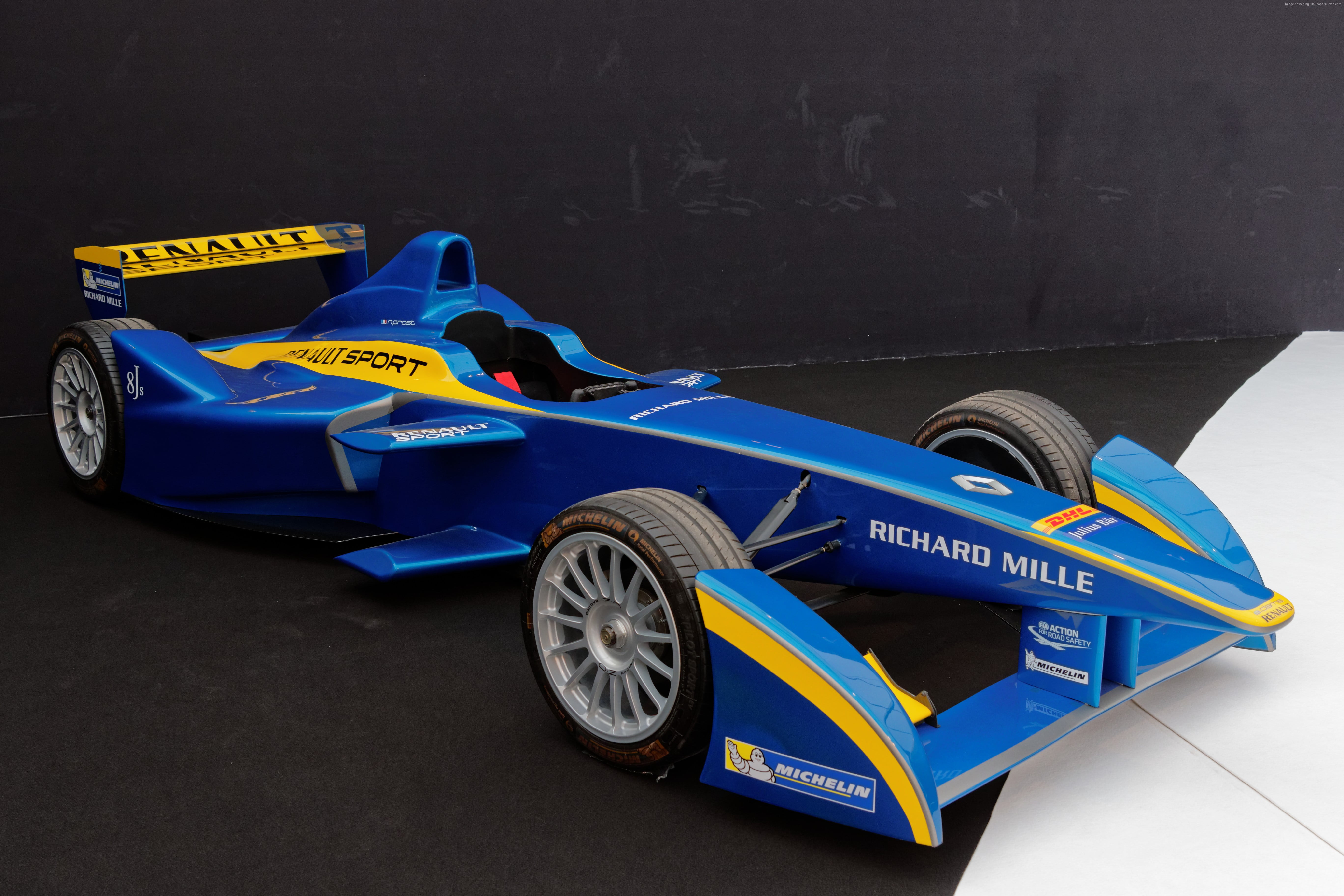 blue and yellow Renault Richard Mille formula 1 car on black surface