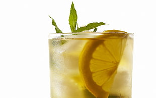 lemon juice in clear drinking glass