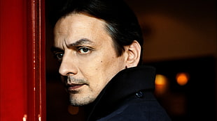 shallow focus photography of man in black jacket HD wallpaper