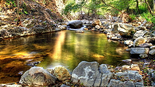 rocks near river during daytime HD wallpaper