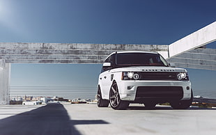 white Land Rover Range Rover parked