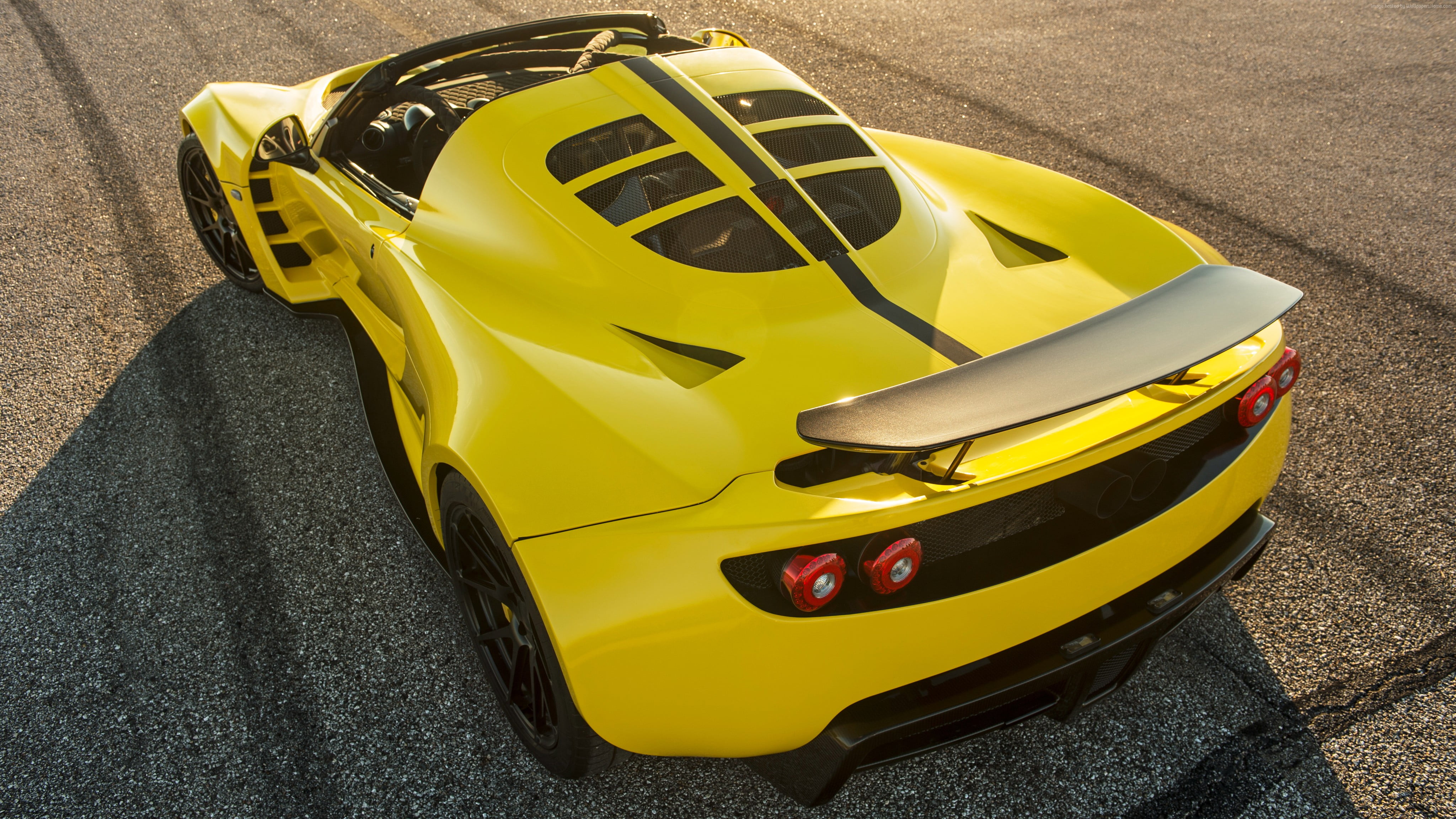 yellow and black sports car