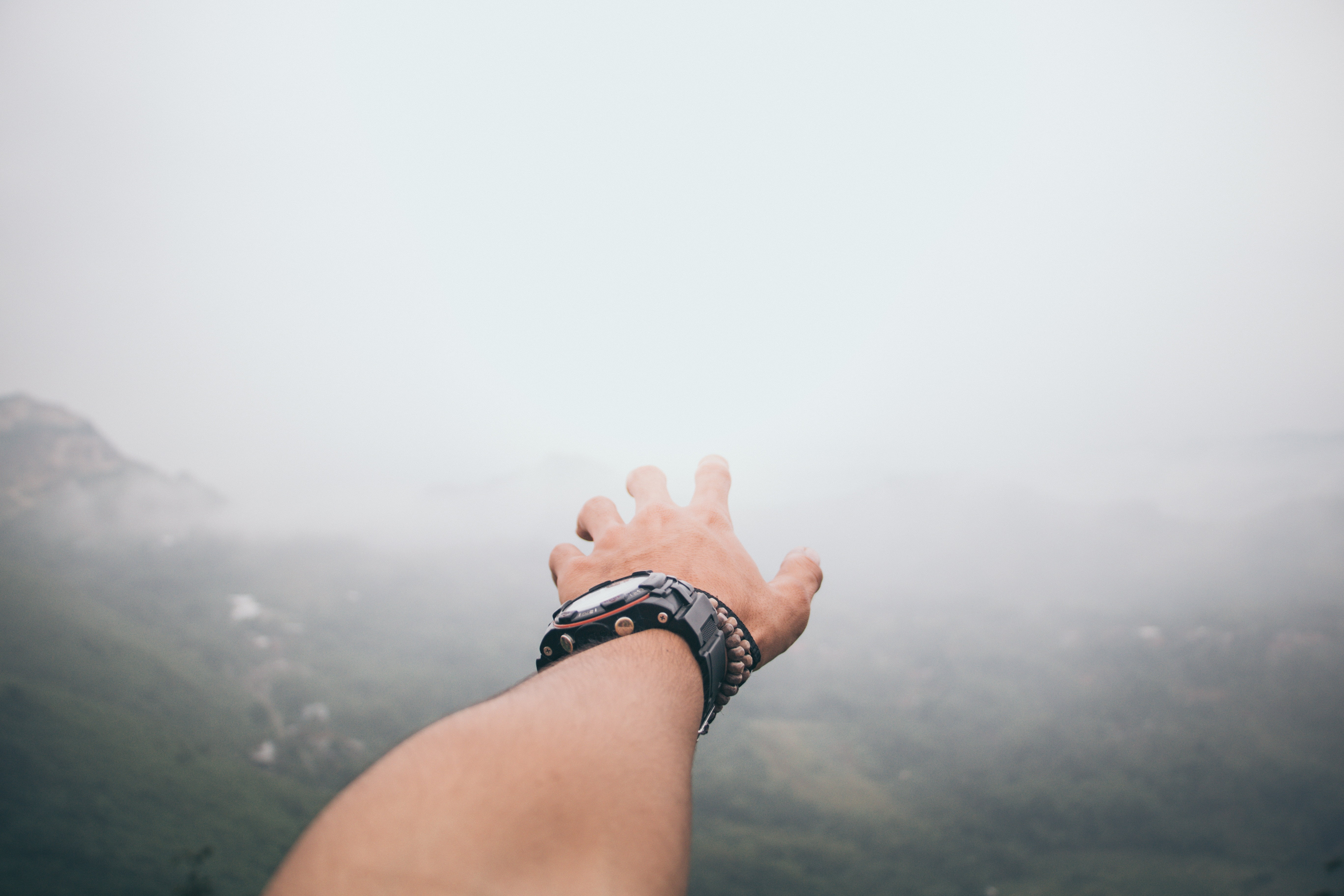 man with black and grey watch