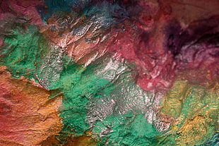 green, yellow, and red abstract painting