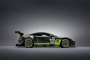 photo of black and green racing car