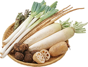 white radish,onion spring,brown potatoes on brown wicker basket