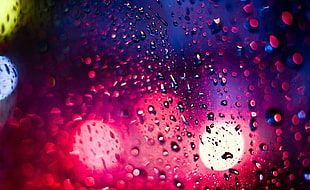 photo of raindrops in glass window HD wallpaper