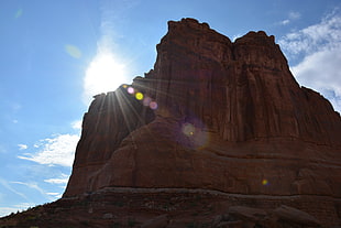 brown rock formation, Sun, rock, sunlight, landscape HD wallpaper