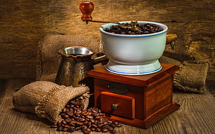 Coffee grinder with sack of coffee beans HD wallpaper