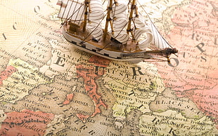 white and brown sailing ship scale model, map, sailing ship, model ship, digital art