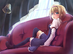 female anime character lying on sofa