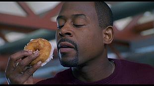 Man holding doughnut HD wallpaper