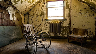 black and gray wheelchair, ruin, abandoned