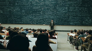 professor standing in front of students