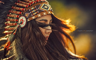 brown, red, and white tribal headdress, brunette, headdress