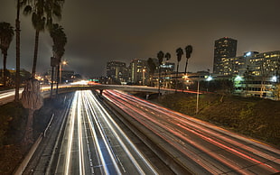 timelapse photography of cars going north and south