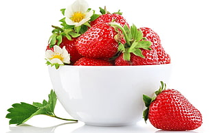 strawberries on white ceramic bowl