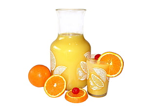 Orange juice on pitcher and glass