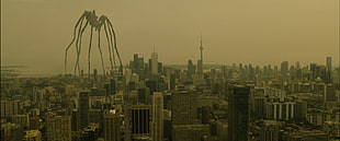 city skyline with giant spider scene