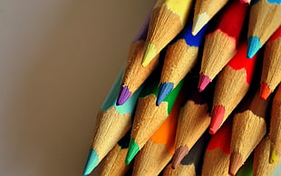 pile of assorted color coloring pencils HD wallpaper