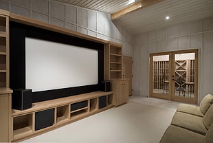 brown wooden entertainment center on white concrete floor HD wallpaper