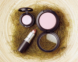 lipstick and two makeup palettes on nest HD wallpaper
