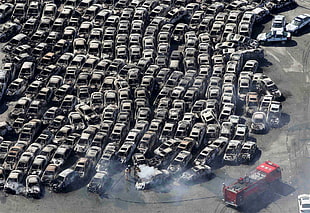 burned sedan lot, Japan, earthquakes