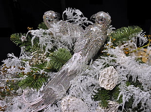 grey glittered bird figurines
