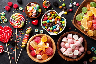 stack of assorted-flavor candies HD wallpaper