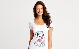 woman in white scoop-neck t-shirt smiling