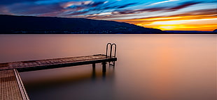 photo of dock during golden hour, annecy