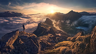 person standing on top of the hill, landscape, mountains, clouds