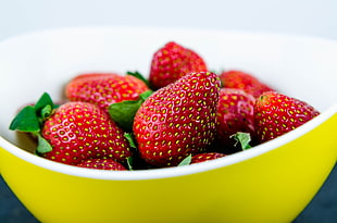 Strawberries in yellow bowl