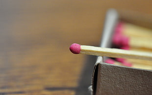shallow focus photography of matchstick