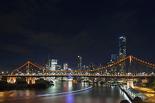 city beside river during nighttime, story bridge, brisbane HD wallpaper