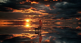 woman with dog under sky digital wallpaper